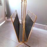 Perforated metal magazine rack 1950