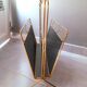 Perforated metal magazine rack 1950