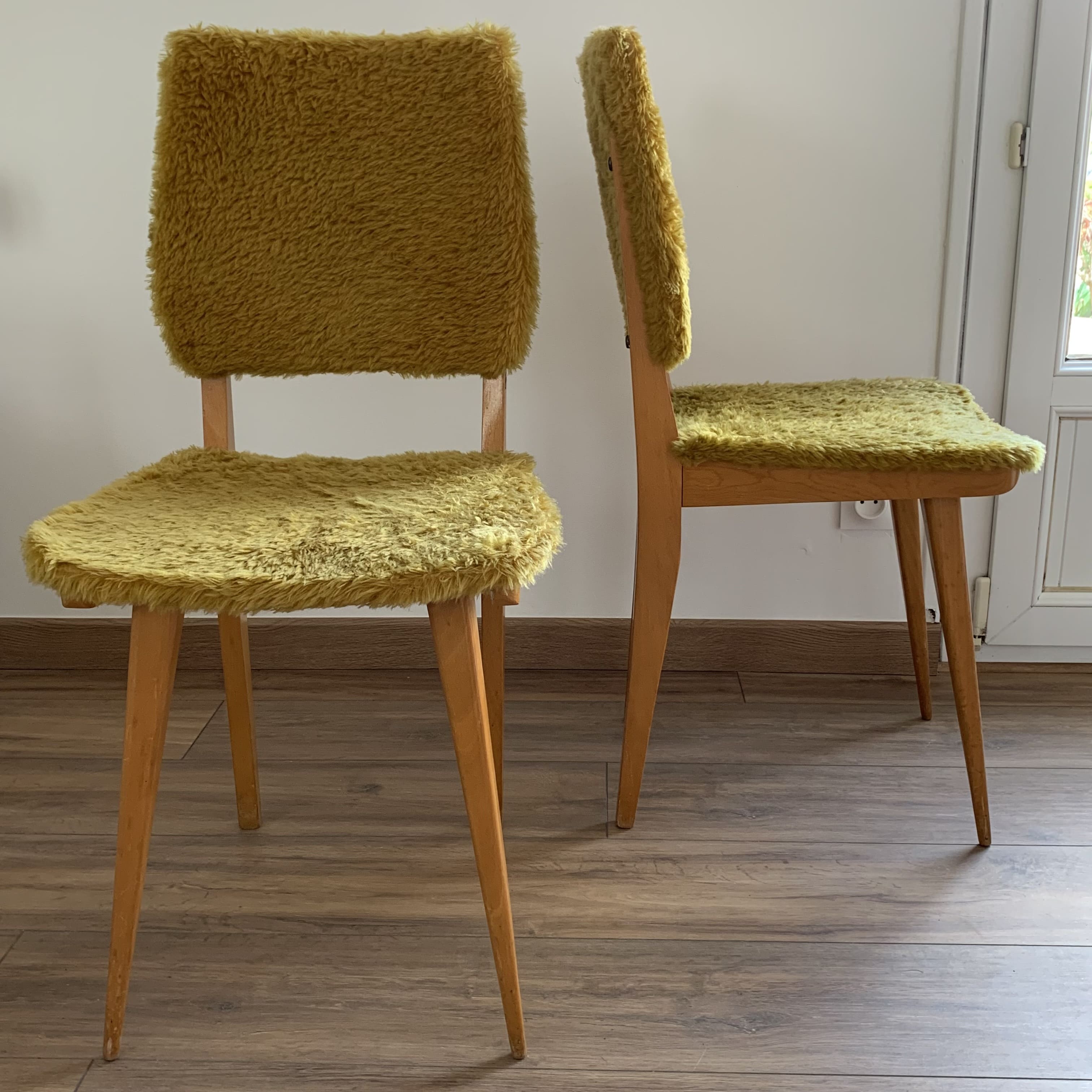 2 yellow moumoute chairs