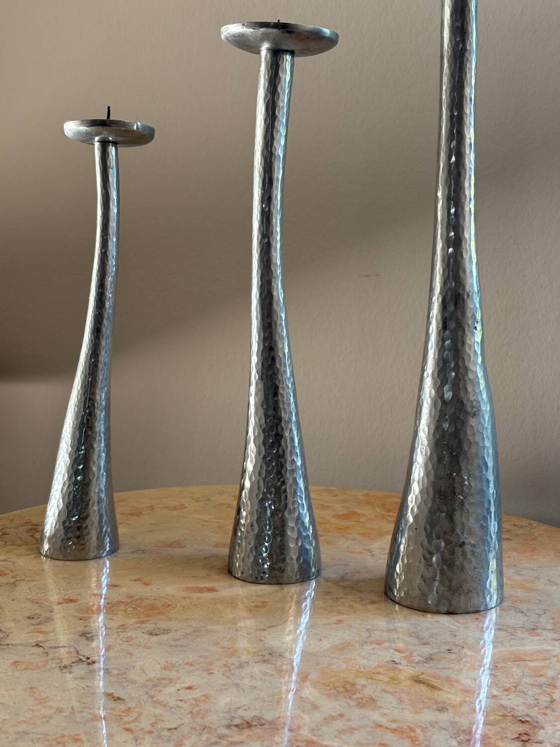 Cast aluminum candle holders