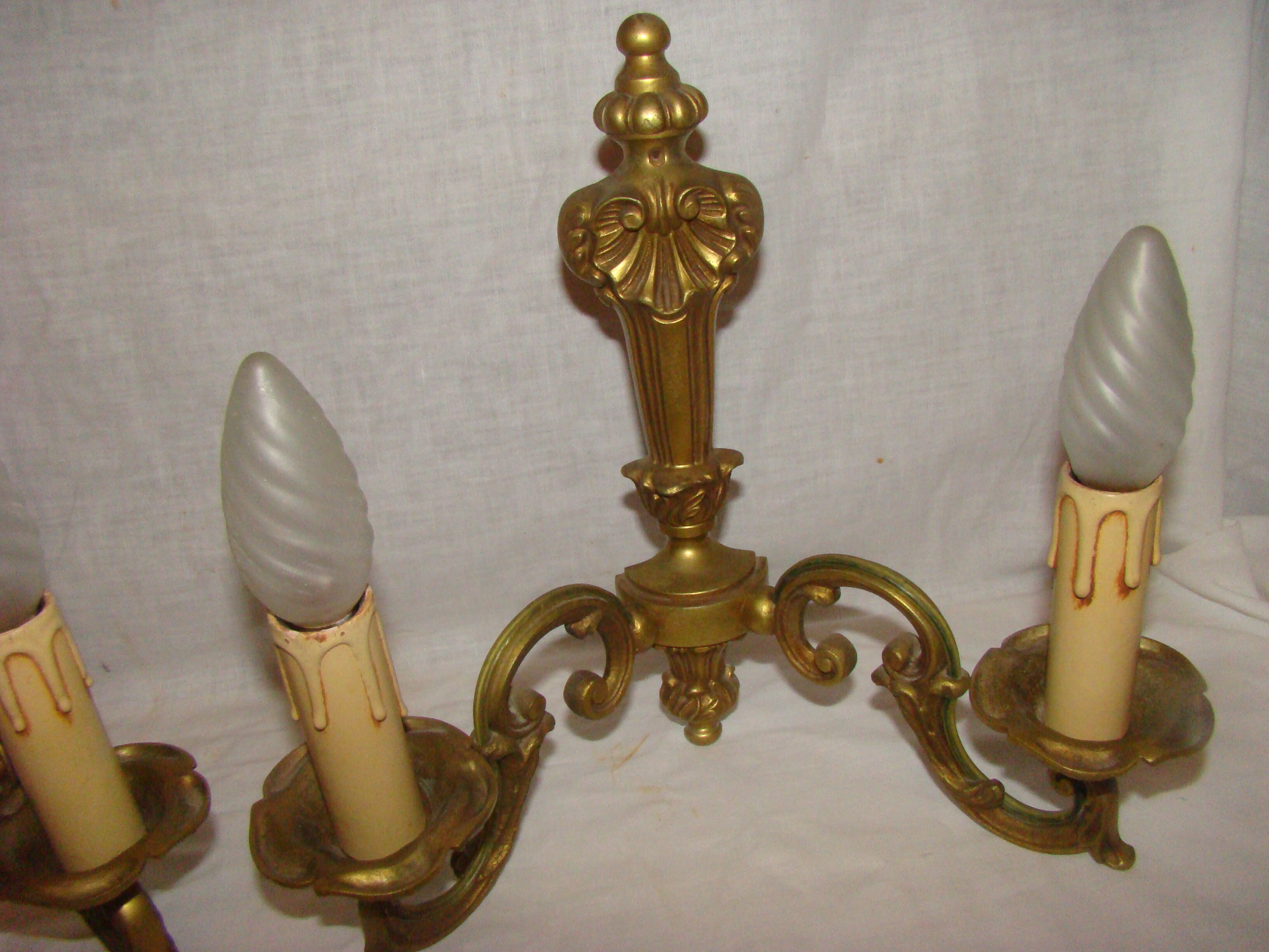 pair of bronze wall lights with 2 arms