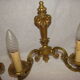 pair of bronze wall lights with 2 arms