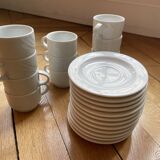 Set of 11 espresso coffee cups with saucers
