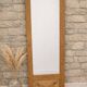 Restored old wardrobe door in a cheval mirror / freestanding mirror.