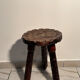 Brutalist sculpted tripod stool in solid wood — 1960s