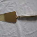 silver metal knife and cake shovel