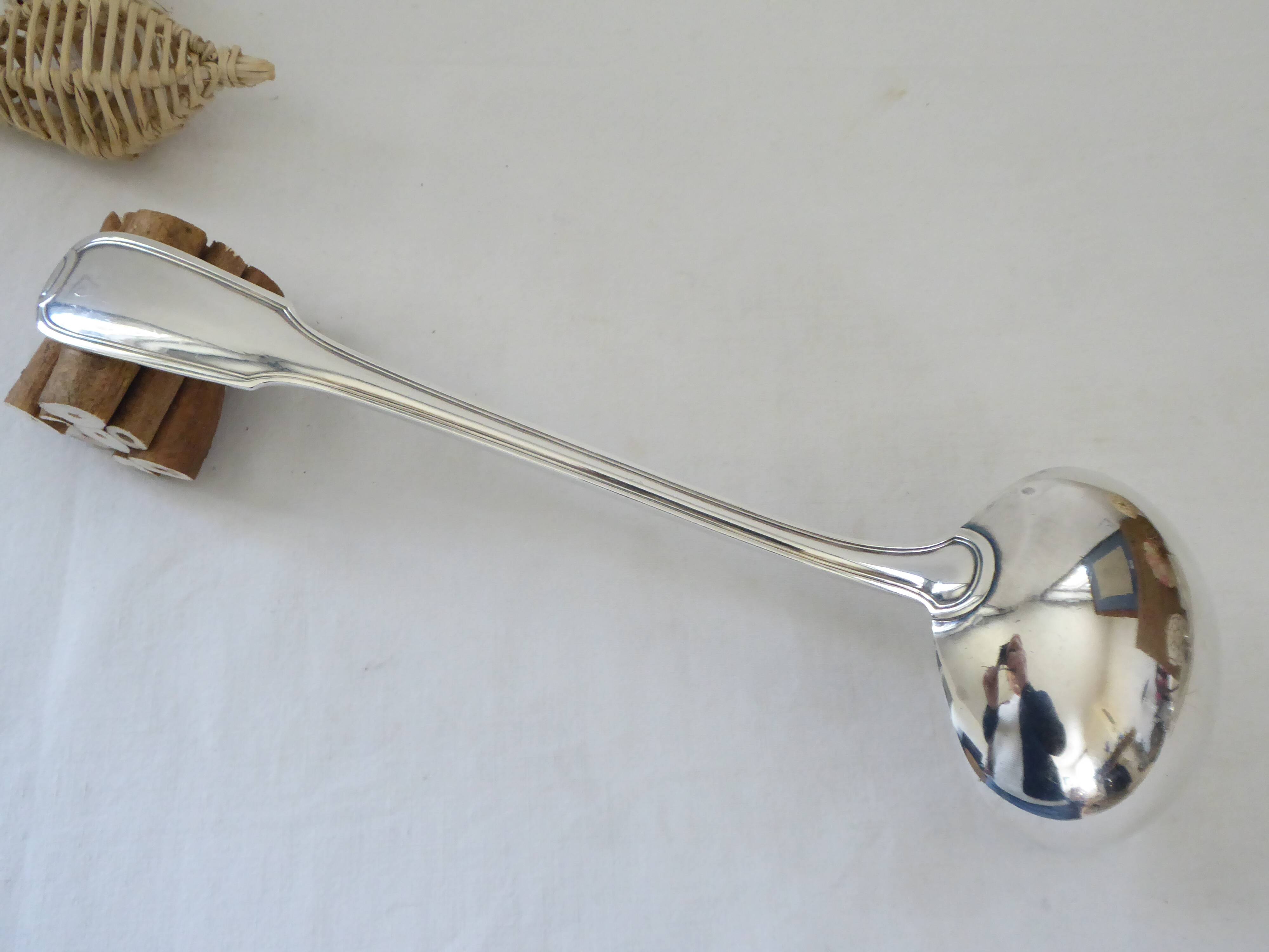 Silver metal ladle