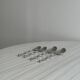 Set of 4 silver-plated metal spoons