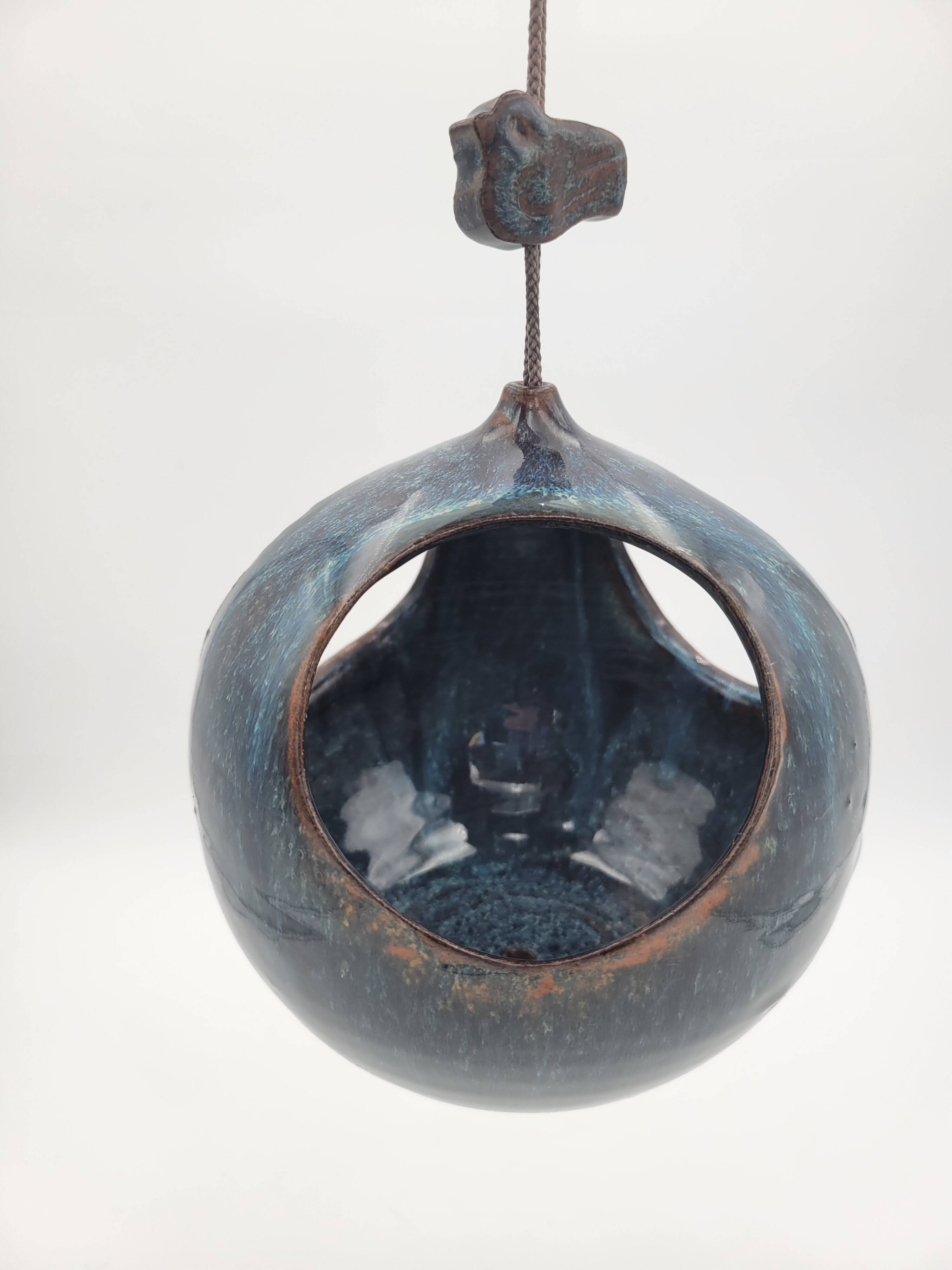 Designer bird feeder / plant stand