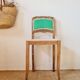 Renovated antique chair – carved wood and green backrest