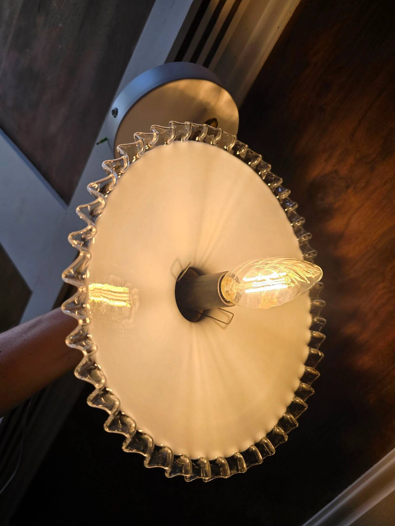 Pair of wall sconces in brass and wavy opaline glass