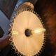 Pair of wall sconces in brass and wavy opaline glass