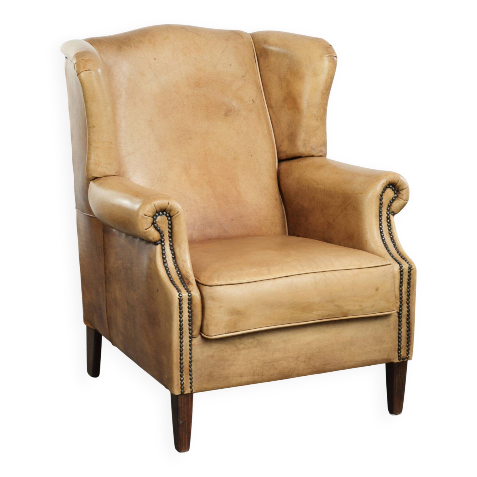 Cow leather wingback armchair with a beautiful timeless English look