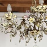 Chandelier with a floral porcelain decoration and pendants