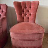 A pair of small tub chairs.