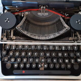 Portable, functional typewriter with user manual