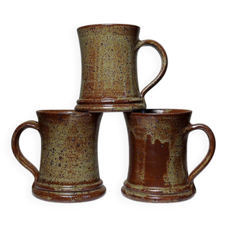 Trio of vintage handcrafted pyrite stoneware beer or cider mugs