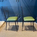 Pair of green vinyl chairs with black steel legs by Colette Gueden