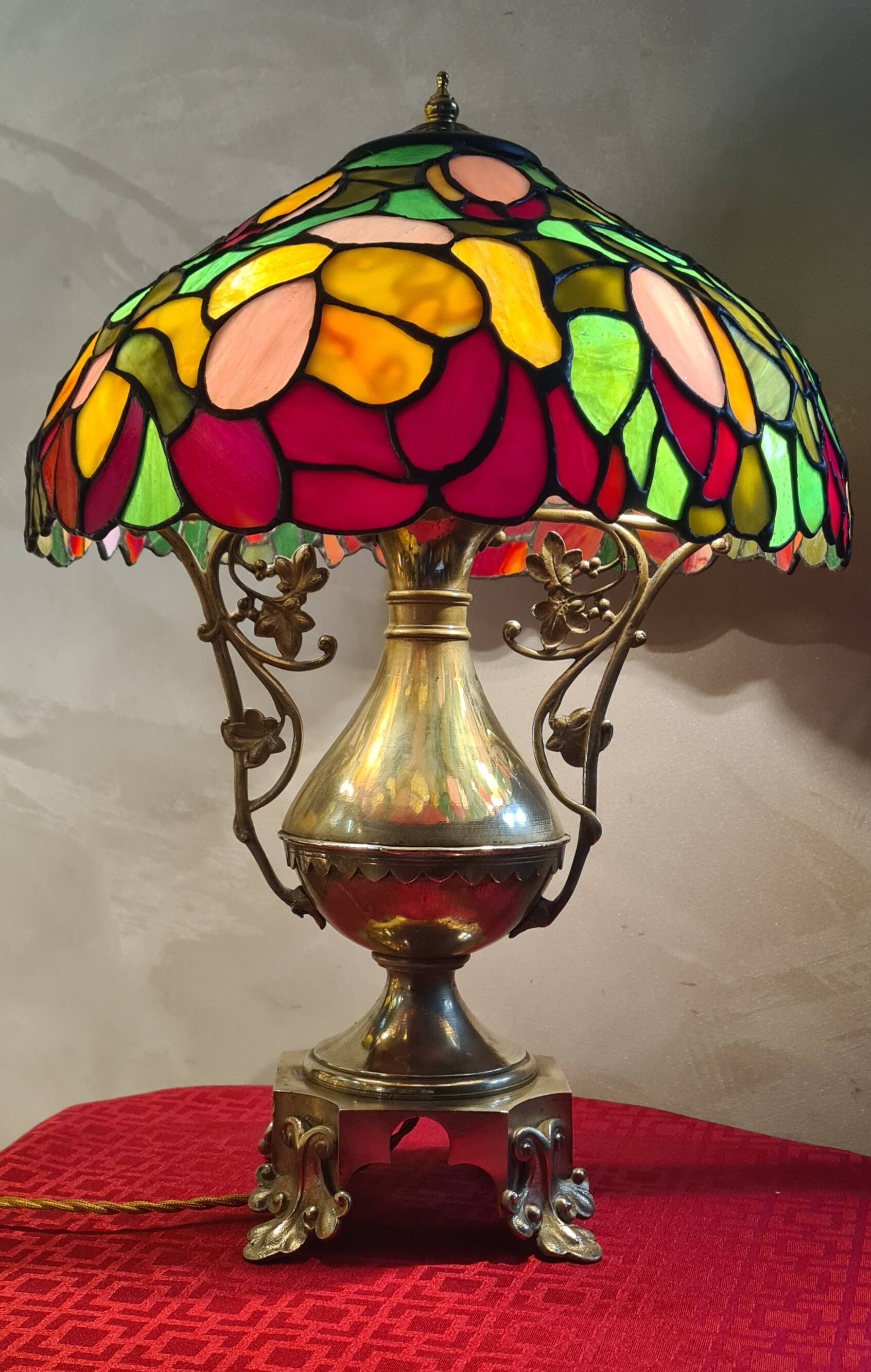 Antique bronze lamp and Tiffany-style stained glass shade. 46x32