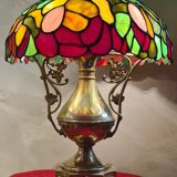 Antique bronze lamp and Tiffany-style stained glass shade. 46x32