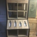 Store display for whisky and rum in metal and melamine