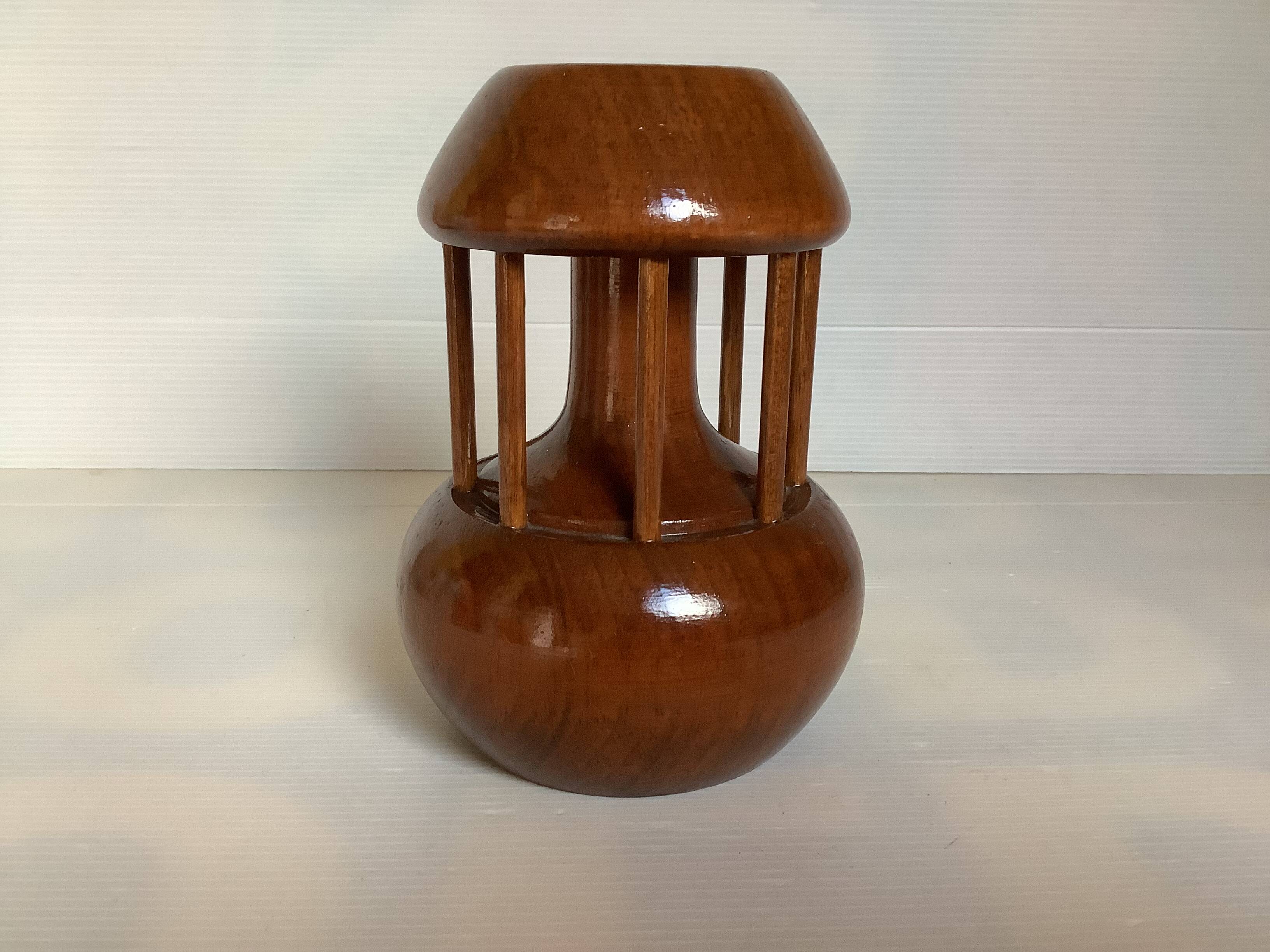 Varnished wooden candle holder