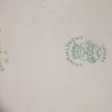 A flat bottom and two enamel bottle bottoms of Longwy