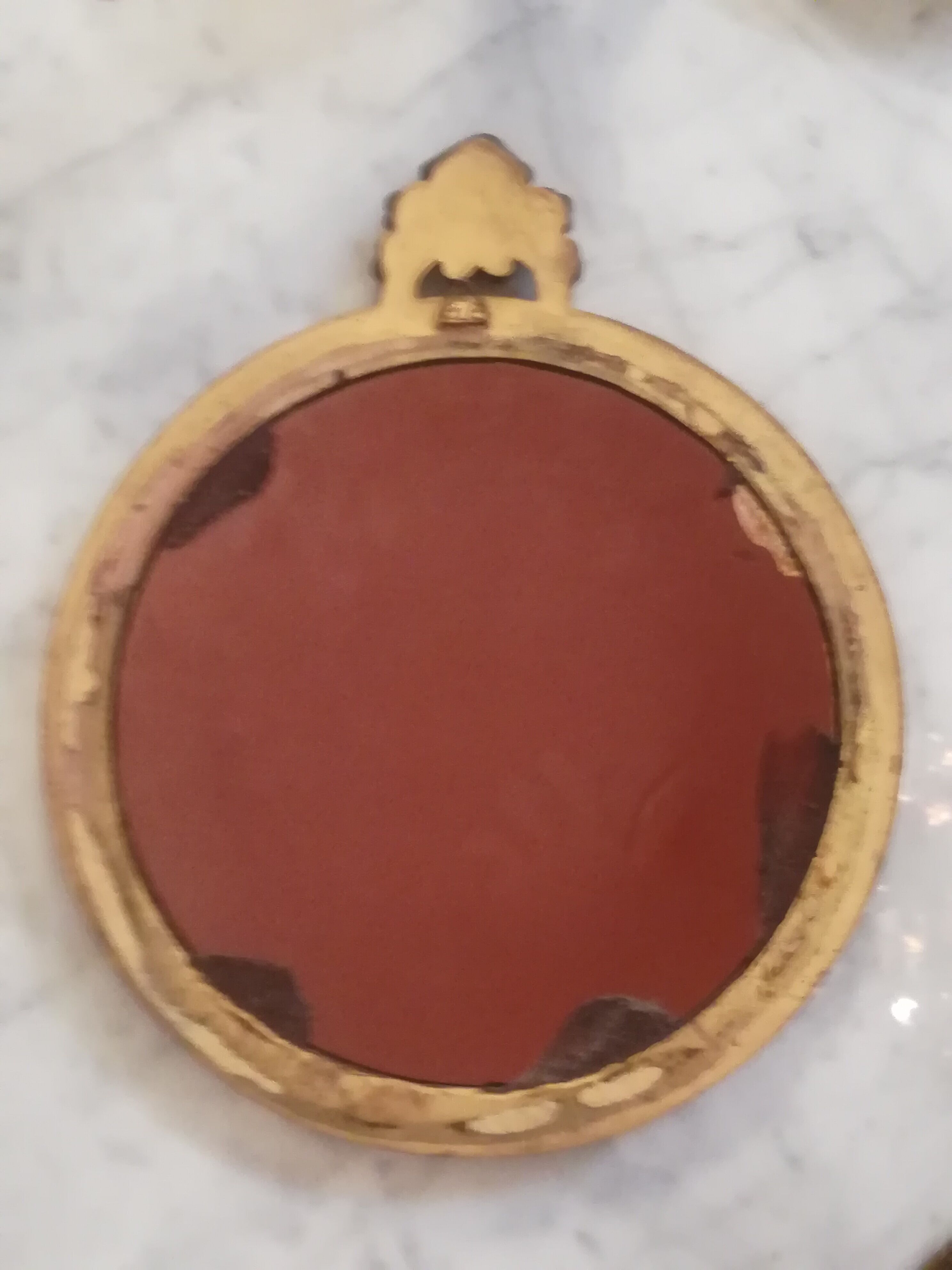 Witch mirror in gilded resin 60s
