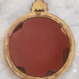 Witch mirror in gilded resin 60s