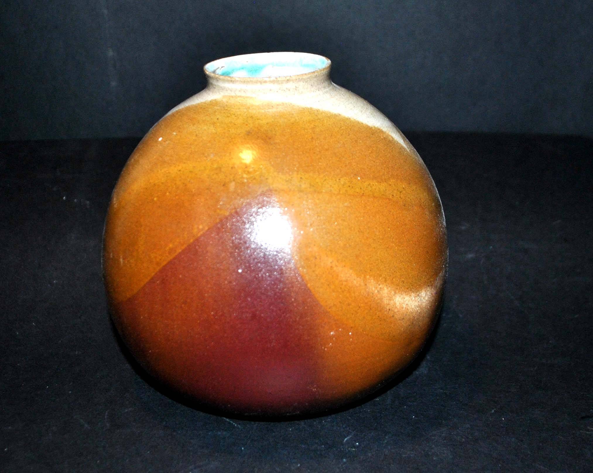 Vintage ball vase in flamed stoneware 1960 - caramel color with blue flow - signed DS