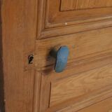 Old communication door with wood effect paint