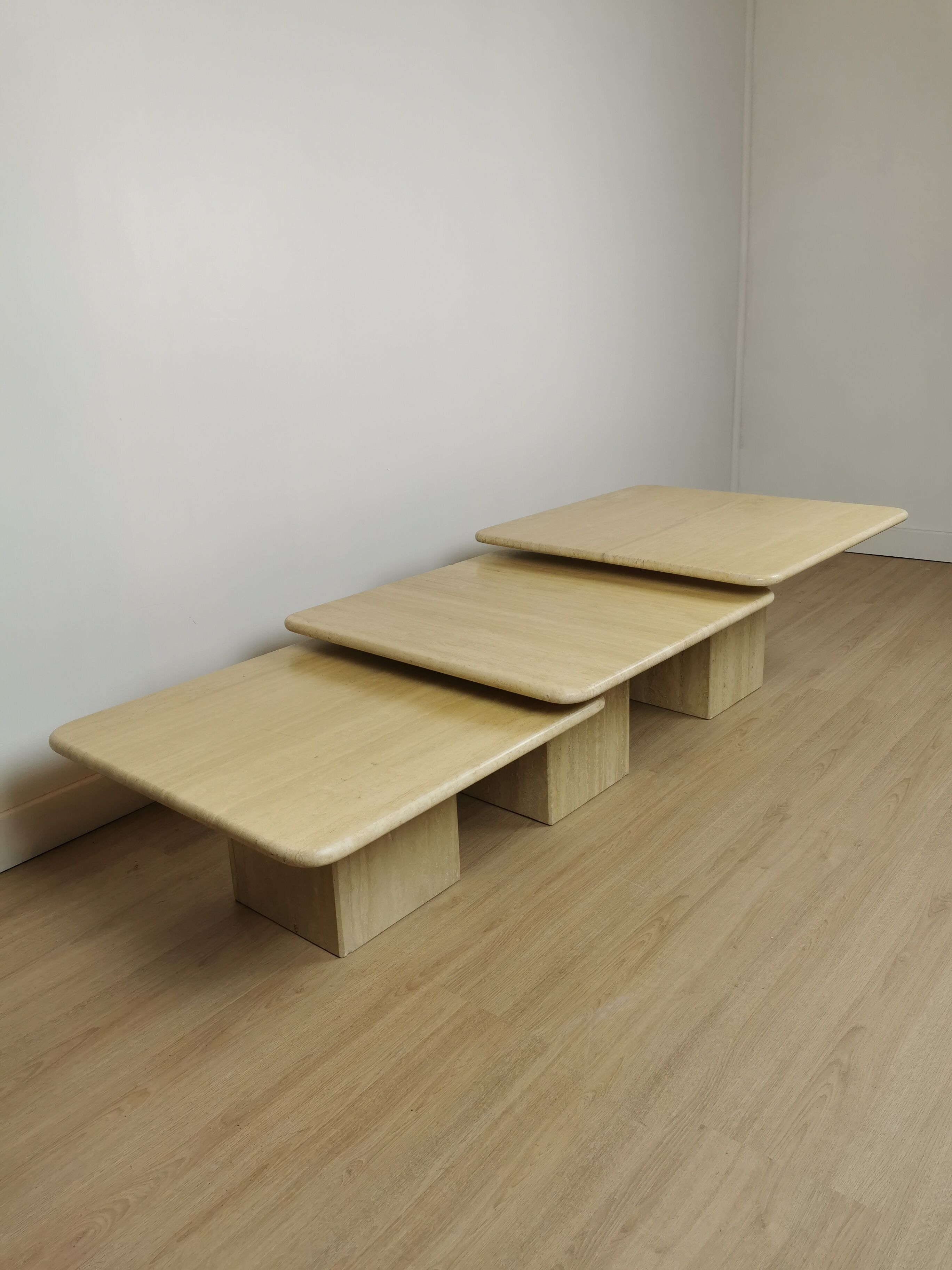 Side tables in travertine 70s