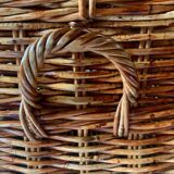 Wicker trunk with leather straps