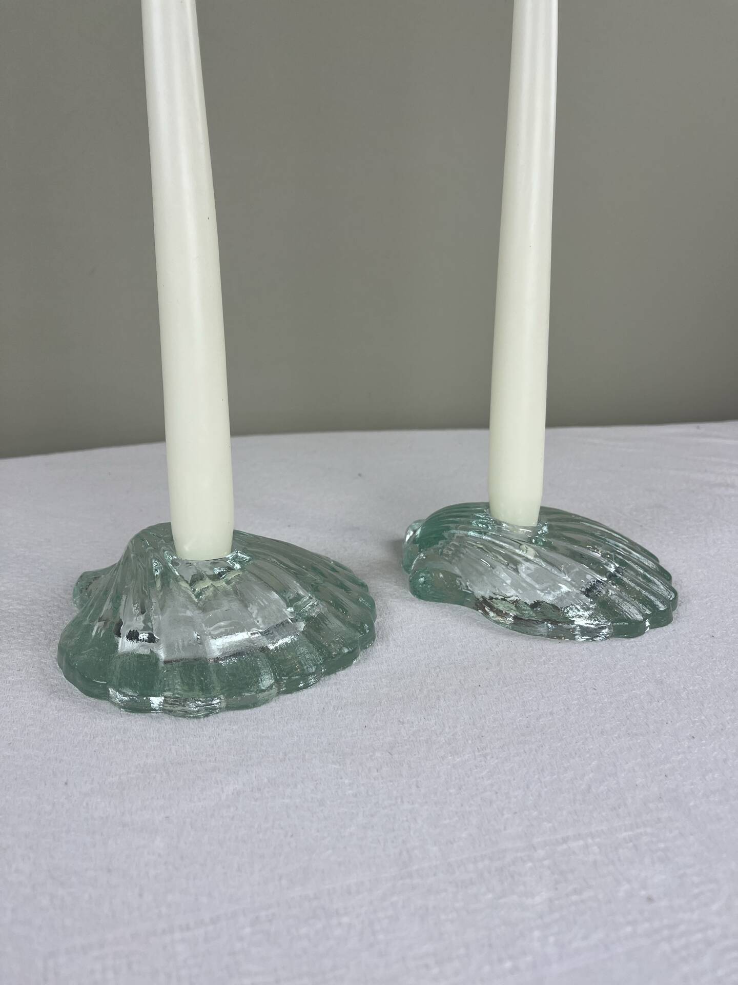 Pair of scallop shell candlesticks