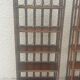 Pair of rattan shelves