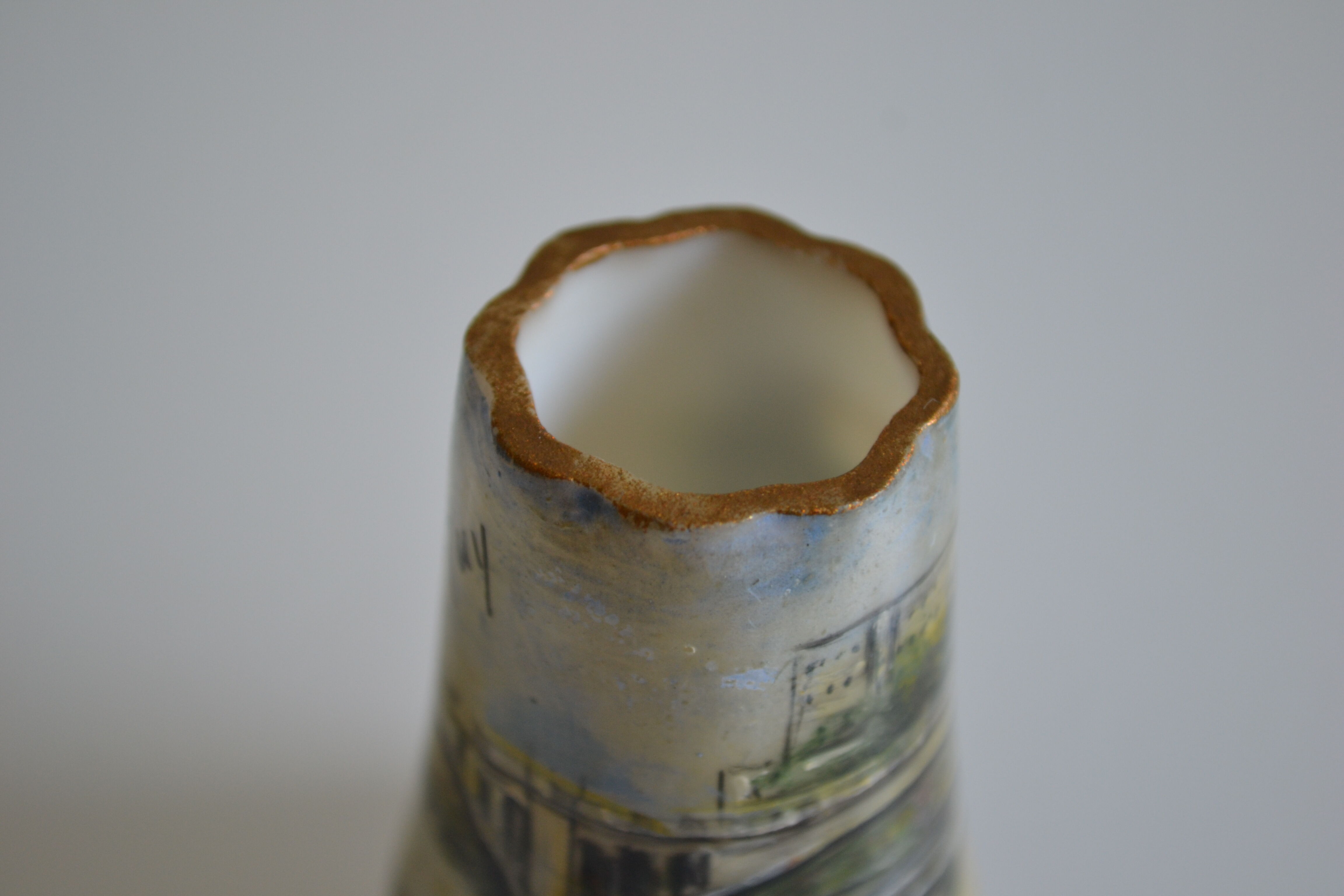 miniature vase with painted decoration from the city of Huy in Belgium