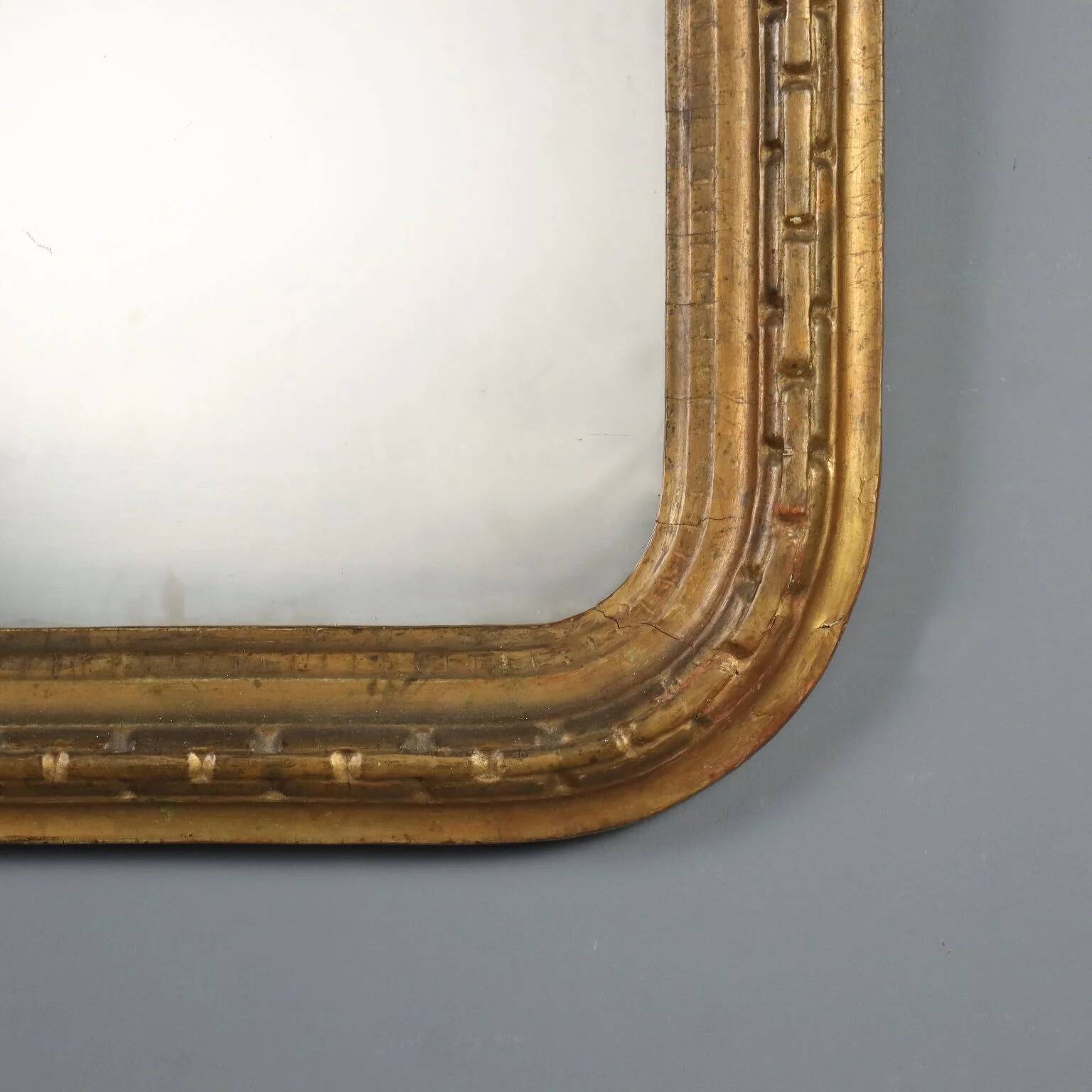 Miroir ancien en bois sculpté et doré, Italie, XIXe siècle