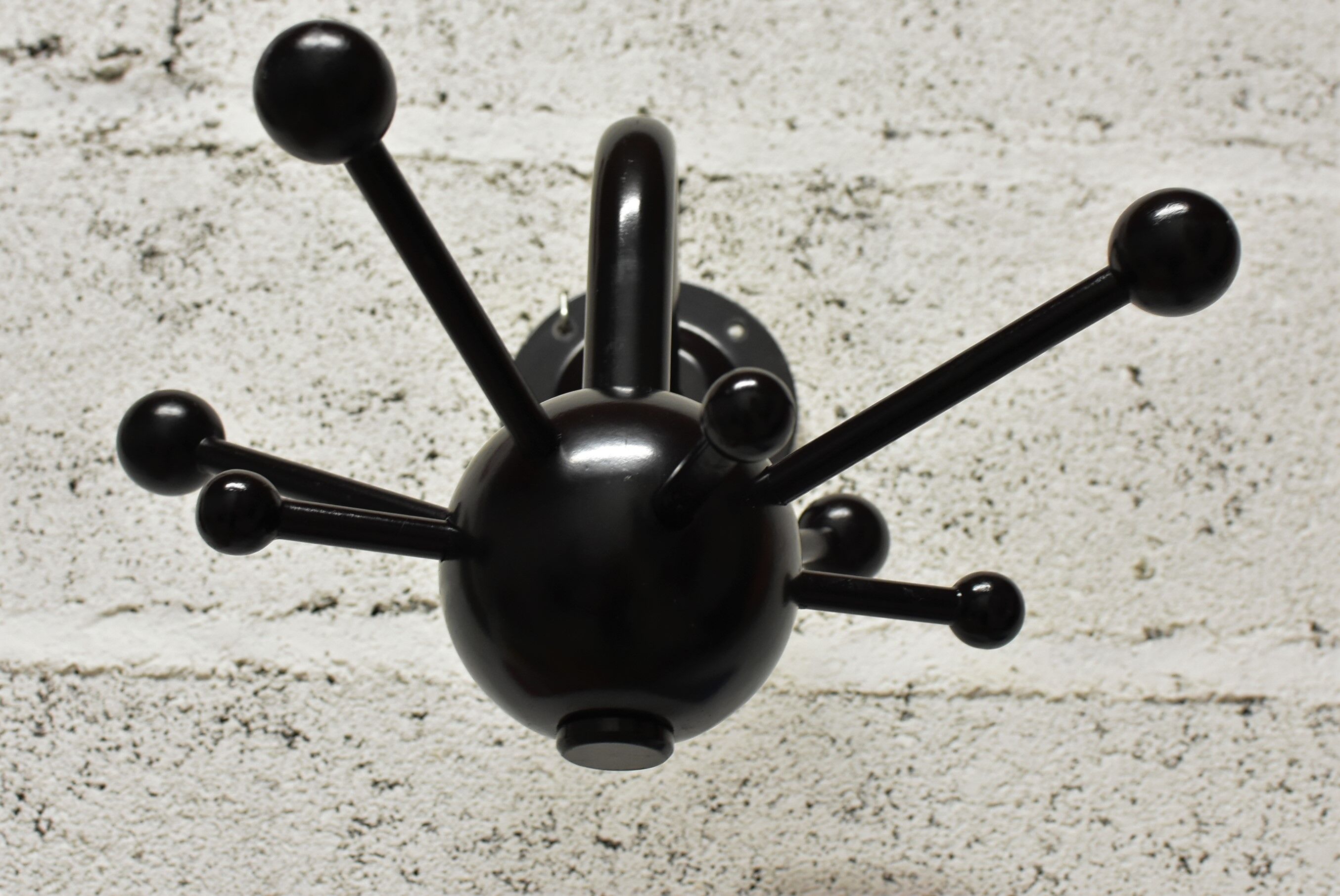 Black sputnik coat rack