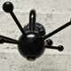 Black sputnik coat rack