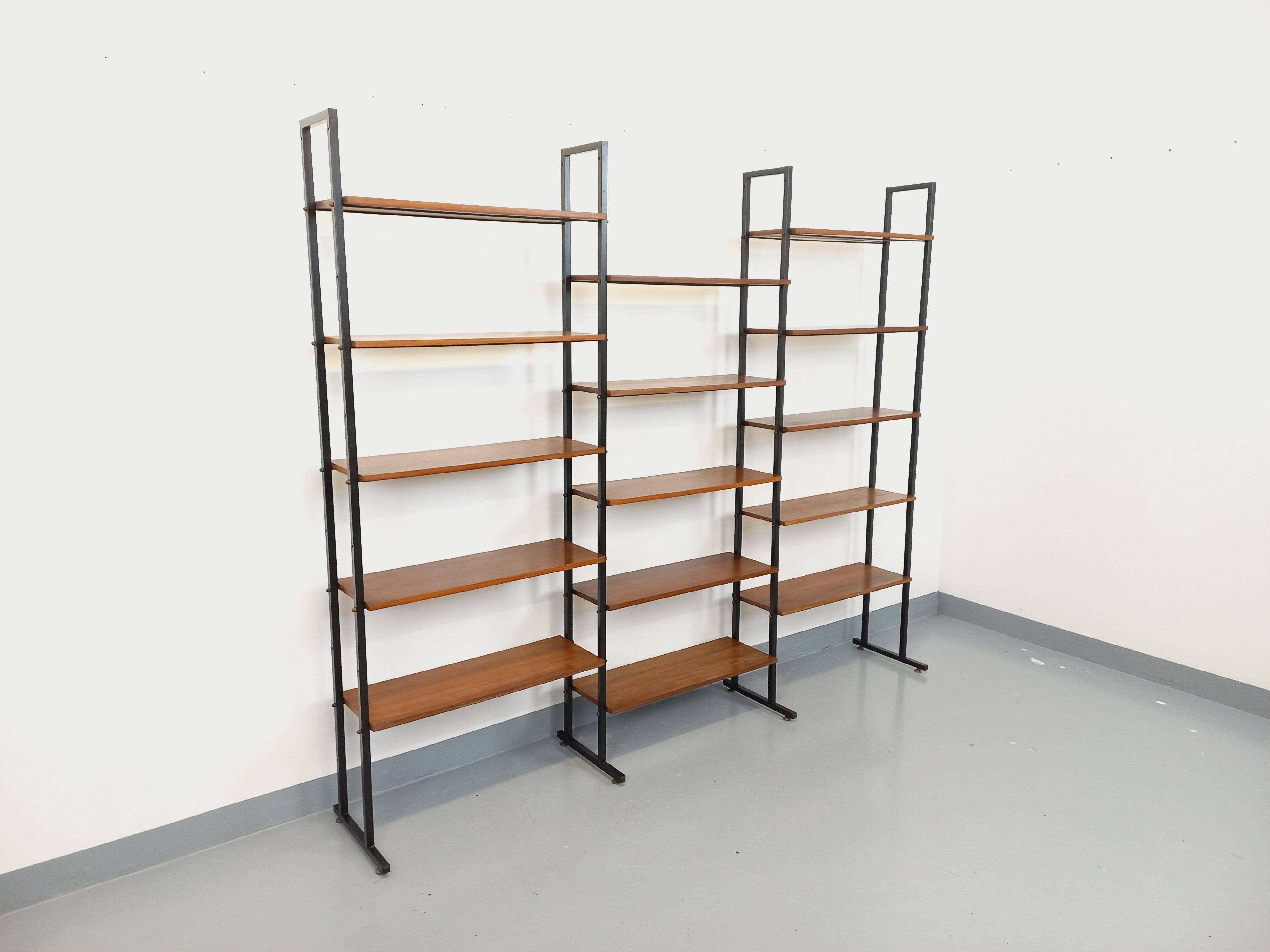Vintage Italian triple modular bookshelf in teak and metal.