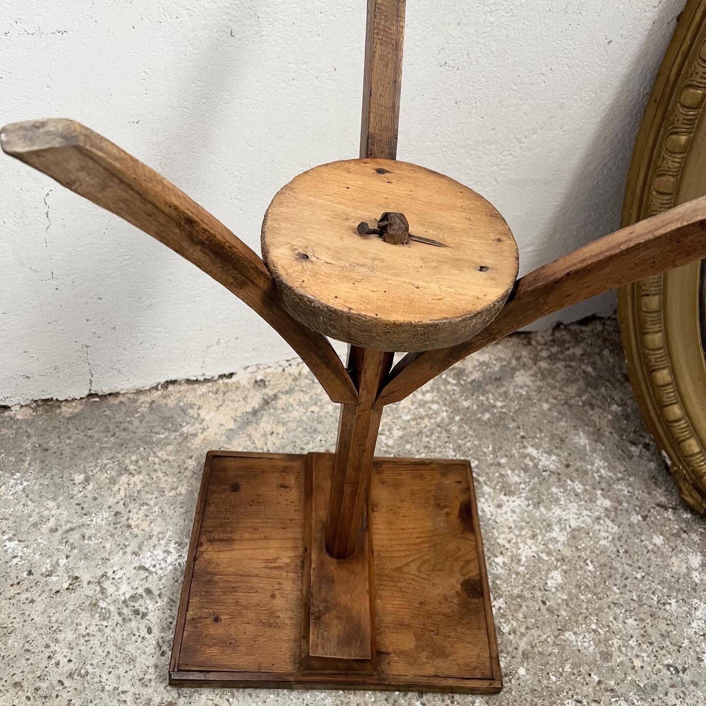 Old primitive wooden tripod pedestal table
