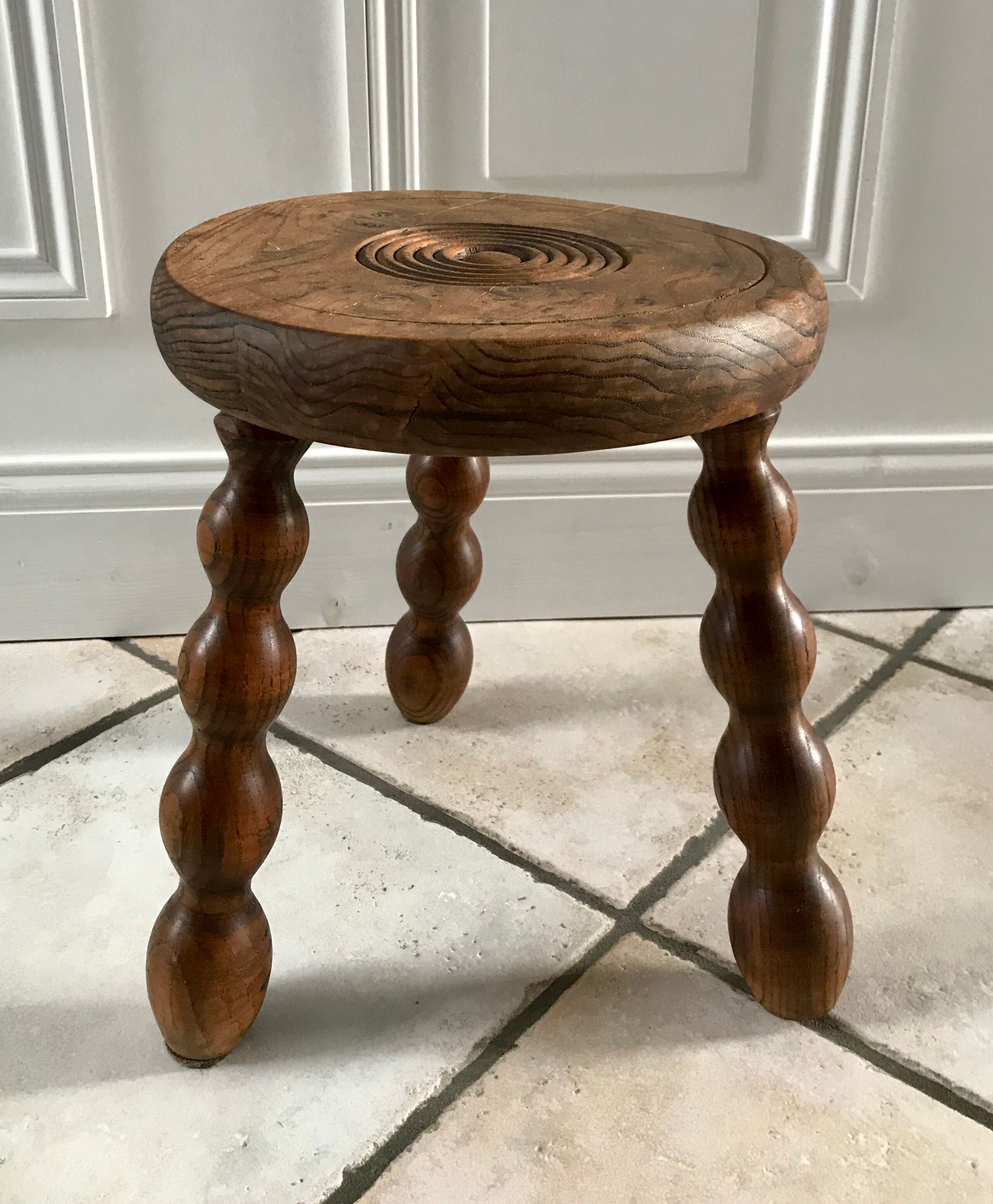 Low wooden stool turned solid 70s