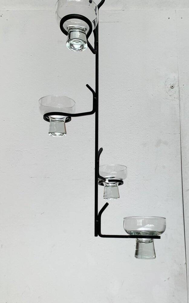 Mid-century metal and glass pendant light from the 1960s.