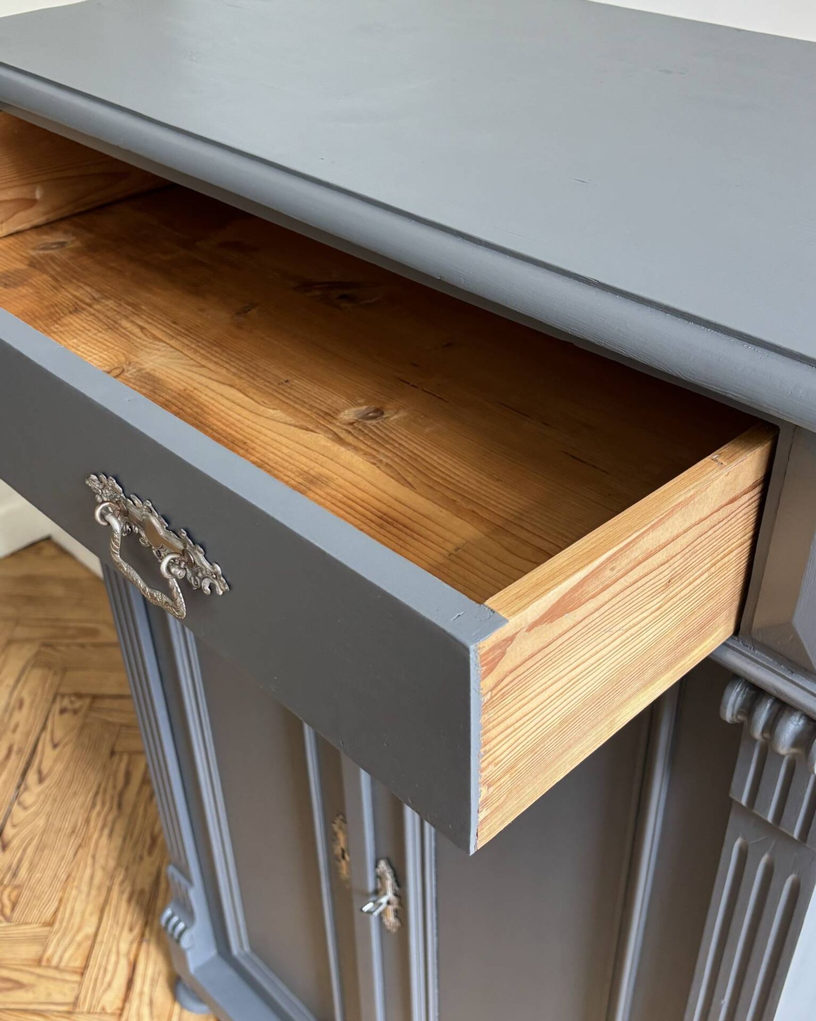 Antique buffet in the style of a vertiko from the late 19th century.