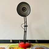 Old articulated desk lamp in red metal