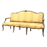 Natural wood canapé, moulded and carved, late 19th to early 20th century.