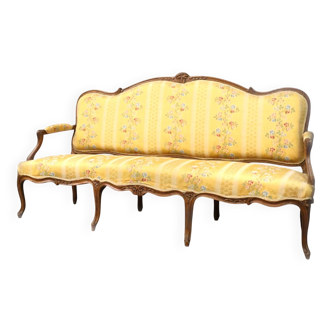 Natural wood canapé, moulded and carved, late 19th to early 20th century.