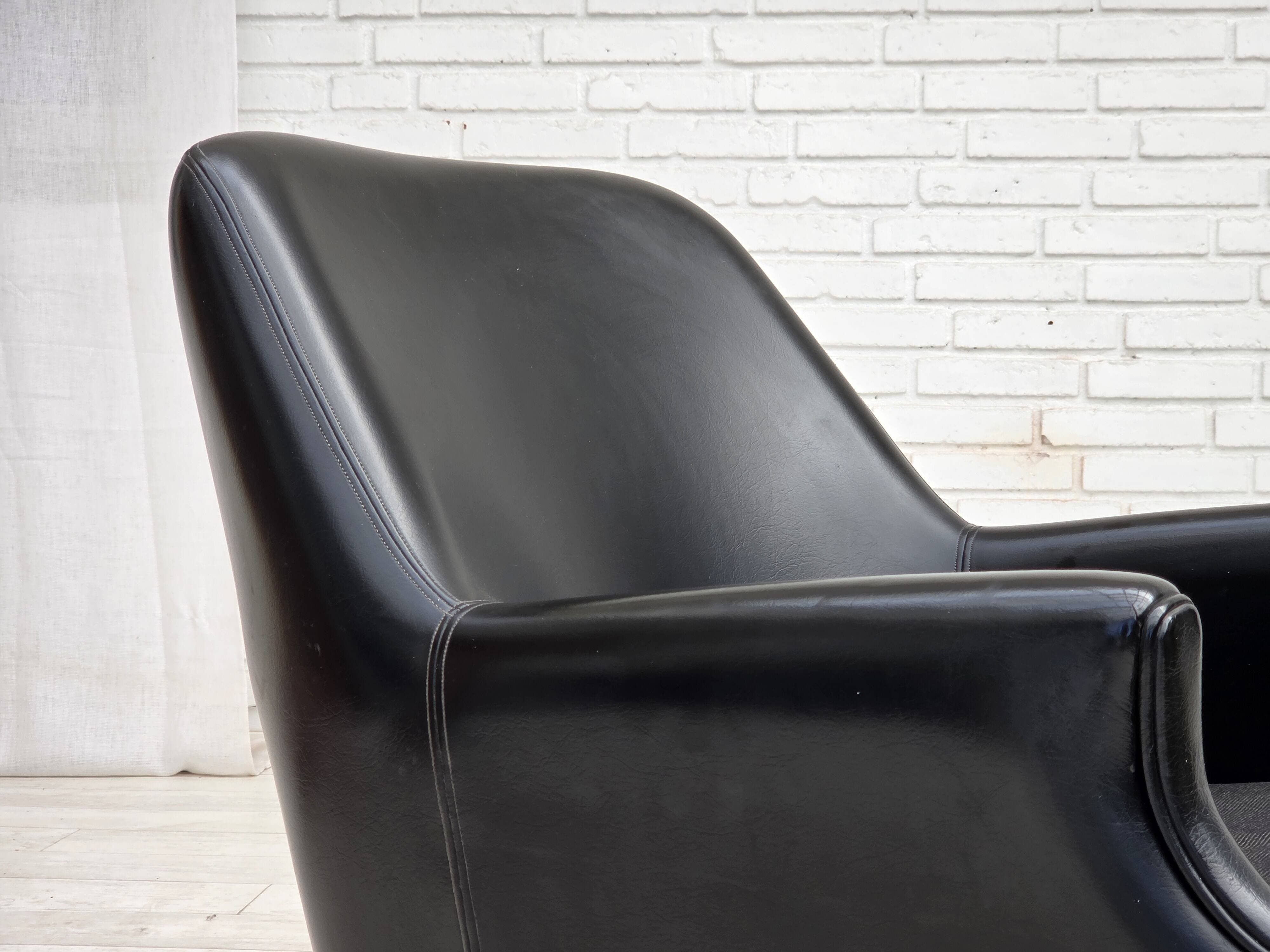 1970s, Danish armchair, artificial leather, teak wood legs.