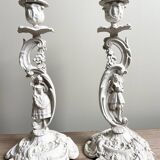 Pair of patinated candlesticks