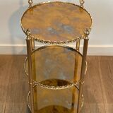 Round silver-plated brass table with triple eglomisé mirror tops from Maison Jansen.